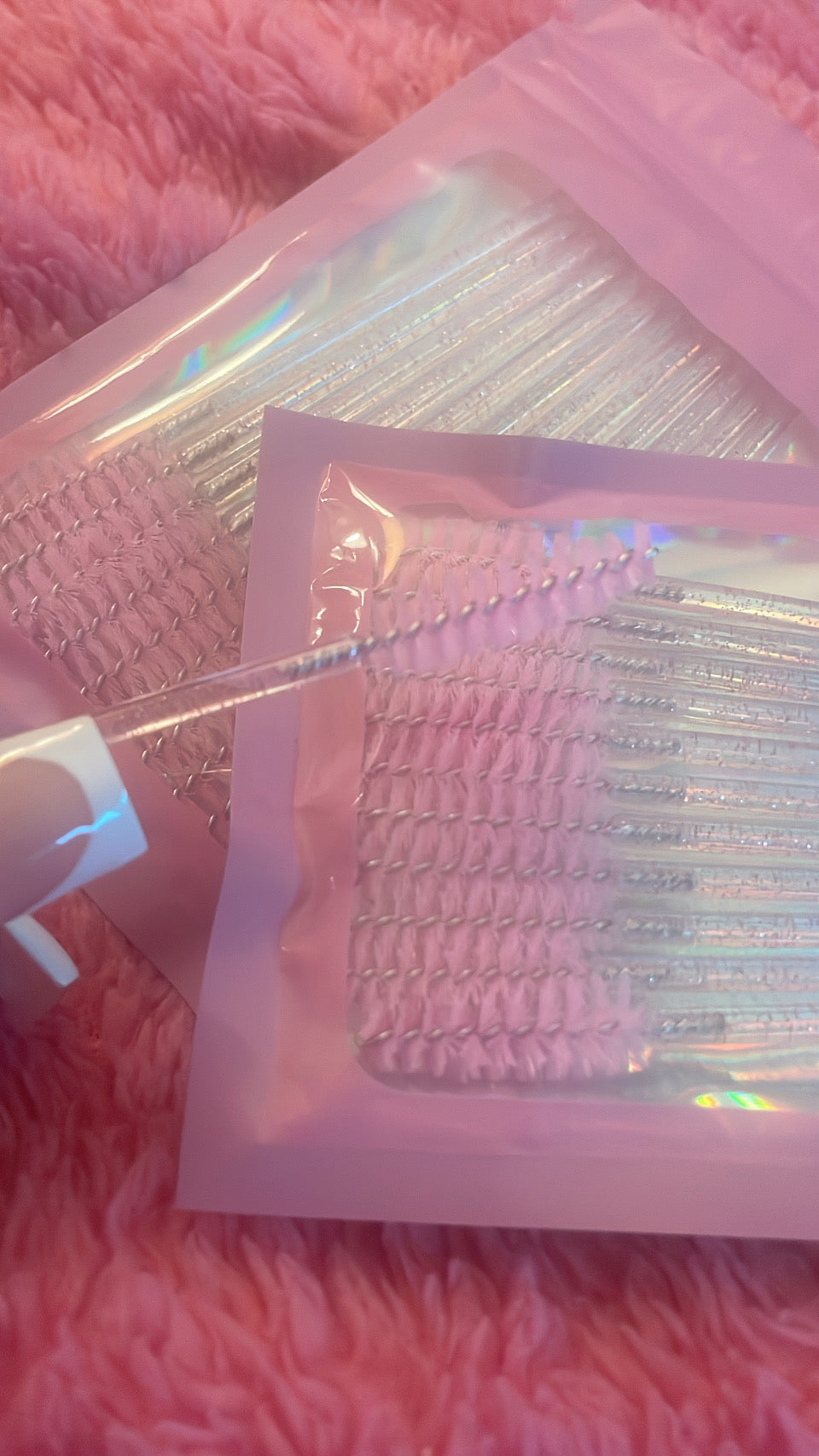 Pink glitter spoolie brushes