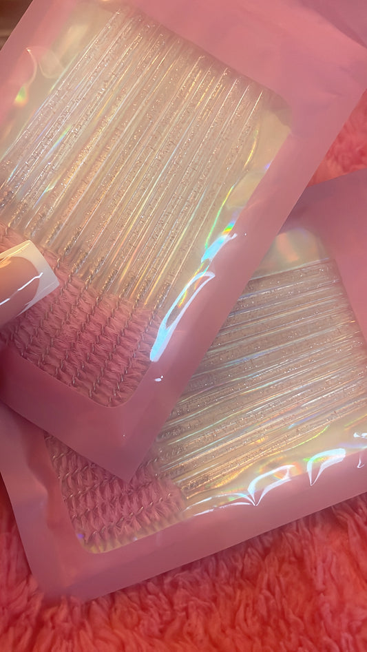 Pink glitter spoolie brushes